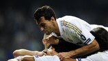 Álvaro Arbeloa dives in to celebrate Mesut Özil's goal in Madrid's 4-0 win against Lyon