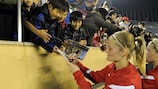 Katie Chapman signs autographs after Arsenal's draw against INAC Kobe in Tokyo