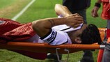 Éver Banega is taken off on a stretcher on Tuesday