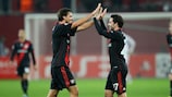 Leverkusen celebrate their matchday five win and qualification for the last 16