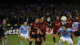 Napoli's Edinson Cavani stoops to turn in the winner against Manchester City on matchday five