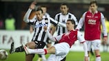 AZ's Maarten Martens chases down Udinese's Damiano Ferronetti