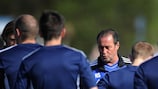 Huub Stevens talks to his players in training on Wednesday