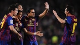 Alexis Sánchez is mobbed by his Barcelona team-mates after scoring the opener