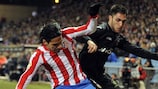 Atlético striker Falcao tangles with Víctor Ruiz of Valencia in their domestic league meeting in February