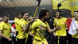 Patrick Owomoyela (centre) leads the celebrations after Dortmund's German Cup success