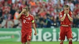 Philipp Lahm (left) and Bastian Schweinsteiger show their anguish after the 2012 final in Munich