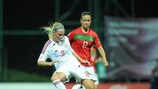 Denmark midfielder Julie Jensen vies wtih Tatiana Pinto of Portugal