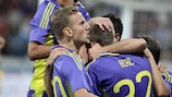 Maribor's Robert Berić is mobbed by his team-mates