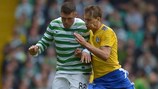 Celtic's Gary Hooper (left) vies for possession with Joel Perovuo of HJK in the first leg