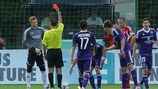 Ekranas goalkeeper Emilijus Zubas is shown a red card in the first half
