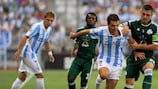 Málaga's Jérémy Toulalan tussles with Kostas Katsouranis during Panathinaikos's 2-0 defeat in Spain