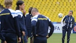 Fenerbahçe coach Aykut Kocaman oversees training on the eve of the play-off first leg