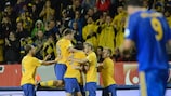 Rasmus Elm is mobbed by his Sweden team-mates
