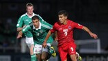 Luxembourg goalscorer Daniel Da Mota (right) goes past Aaron Hughes