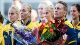Sweden coach Thomas Dennerby is presented with flowers