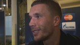 Podolski in two minds over Arsenal success