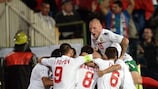 Dimitar Rangelov (centre) is mobbed after scoring Bulgaria's goal
