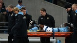 Micah Richards is carried off during the 1-0 win against Swansea