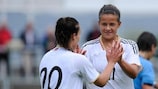 Lena Lotzen (right) celebrates with her Germany team-mate Lina Magull