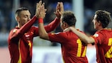 Montenegro celebrate one of their three goals against San Marino