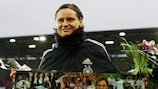 Germany forward Martina Müller receives a commemorative plaque before her final international match