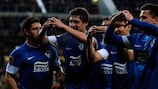Dnipro's Yevhen Seleznyov (2nd L) celebrates with team-mates after scoring