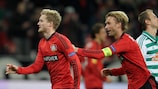 André Schürrle (L) celebrates with Simon Rolfes after making it 2-0 for Leverkusen