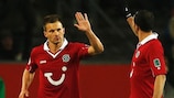 Hannover's Szabolcs Huszti celebrates scoring the first of two penalties against Leverkusen