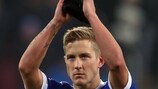 Lewis Holtby applauds the fans after his final game for Schalke