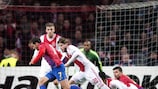 Steaua's Alexandru Chipciu pursued by Ajax's Lasse Schøne