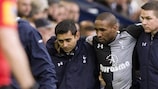 Jermain Defoe is helped off the pitch against West Brom