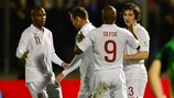 Jermain Defoe and Leighton Baines celebrate one of England's eight goals in Serravalle