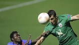 Levante's Obafemi Martins and Rubin's Iván Marcano in action