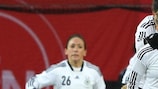 Kim Kulig celebrates her goal against the United States