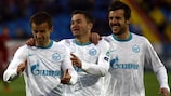 Sergei Semak (left) celebrates a Zenit goal with Viktor Fayzulin and Aleksandar Luković