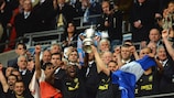 Emmerson Boyce (left) and Gary Caldwell lift the FA Cup