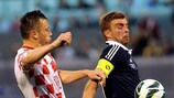 Croatia's Ivica Olić is thwarted by Scotland's James Morrison