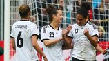 Célia Okoyino da Mbabi celebrates scoring Germany's second in their victory over Japan