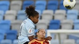 Laura Georges towers above Spain's star striker Verónica Boquete