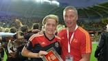 Saskia Bartusiak receives the Player of the Match award from Patrik Andersson