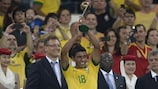 Paulinho celebrates winning the FIFA Confederations Cup with Brazil on home soil