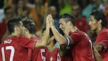 Cristiano Ronaldo (2nd right) celebrates after earning Portugal a draw