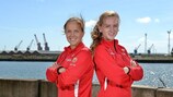 Norway pair Guro Reiten (L) and Andrea Thun pose nearby team headquarters