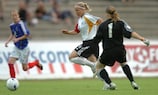 Isabel Kerschowski rounds Véronique Pons before making it 2-0 to Germany in the 2006 final