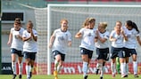 Paige Williams (centre) celebrates finding the net for England