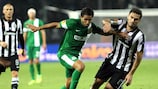 Eyal Golasa of Maccabi Haifa and PAOK's Alexandros Tziolis battle for the ball