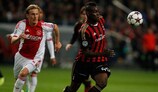 Ajax's Christian Poulsen tracks Milan striker Mario Balotelli