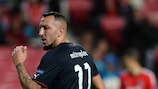 The goals of Kostas Mitroglou helped Olympiacos into the last 16 for the first time in four years