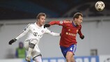 Sergei Ignashevich is challenged by Mario Götze during Bayern's win in Moscow last year
